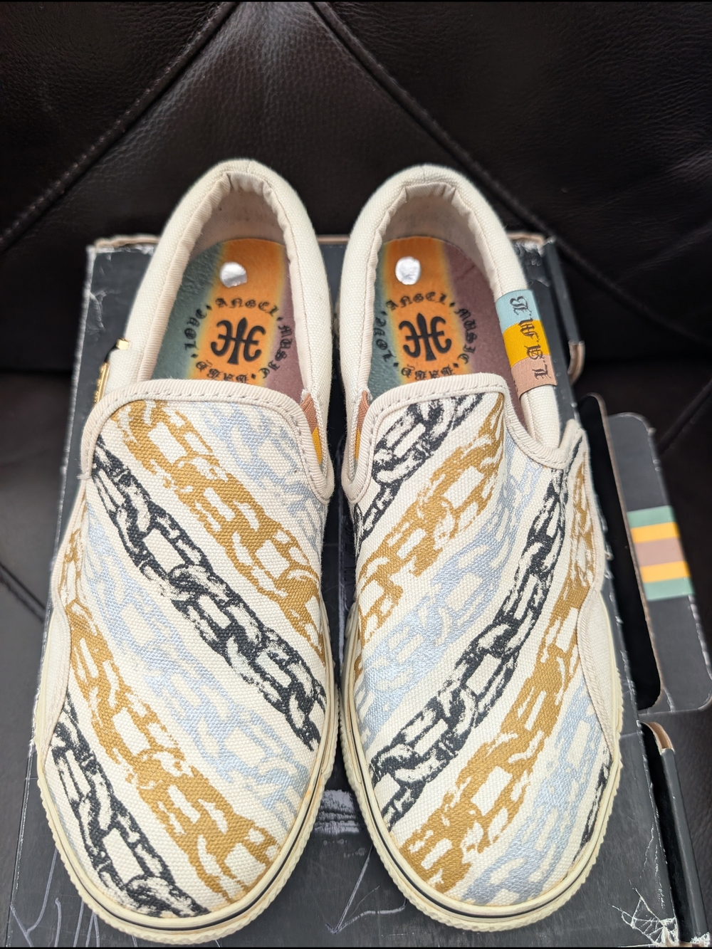 L.A.M.B. Women's Katella Tex Slip-On Sneakers in Cream, Black, Silver & Gold